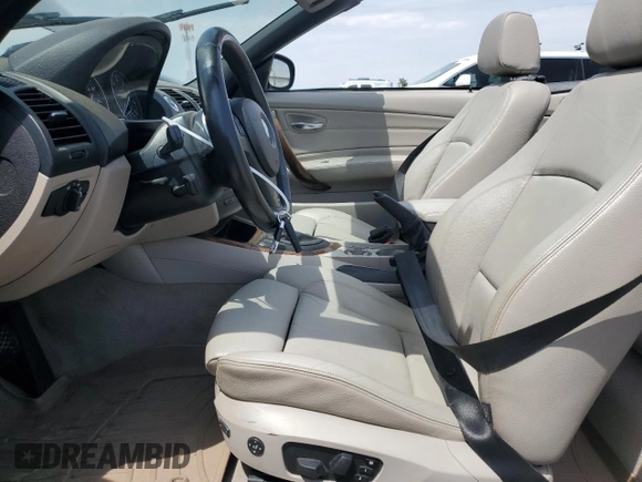 2010 BMW 1 Series 135i with VIN WBAUN9C55AVK41973, listed as a Copart auction lot 54609015 with 144,685 mi miles and Salvage Title. Bid and sale history available at carsss.com. Image 7.