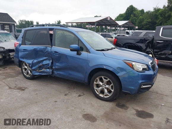 2018 Subaru Forester Touring with VIN JF2SJAWC6JH597365, listed as a IAAI auction lot 42606953 with 66,340 mi miles and . Bid and sale history available at DreamBid. Image 1.