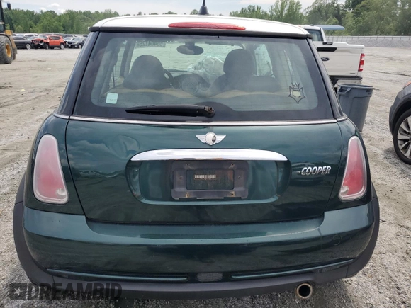 2005 MINI Hardtop z VIN WMWRC33465TC56731, wystawiony jako Copart lot #56404125 z przebiegiem 167 455 mil mil oraz Szkoda całkowita • Salvage title. Historia ofert i sprzedaży dostępna na DreamBid. Obrazek 6.