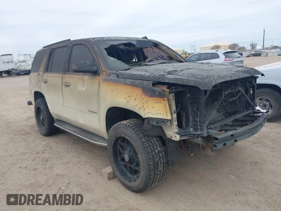 2015 GMC Yukon SLT with VIN 1GKS1BKC0FR114047, listed as a IAAI auction lot 41272792 with 1 mi miles. Bid and sale history available at carsss.com. Image 1.