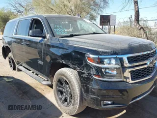 2020 Chevrolet Suburban LT with VIN 1GNSKHKC5LR303081, listed as a IAAI auction lot 41896511 with 60,121 mi miles and . Bid and sale history available at DreamBid. Image 6.
