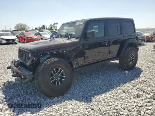 2024 Jeep Wrangler Rubicon X with VIN 1C4RJXFG7RW239587, listed as a Copart auction lot 87060034 with 8,458 mi miles and Salvage title. Bid and sale history available at DreamBid. Image 1.