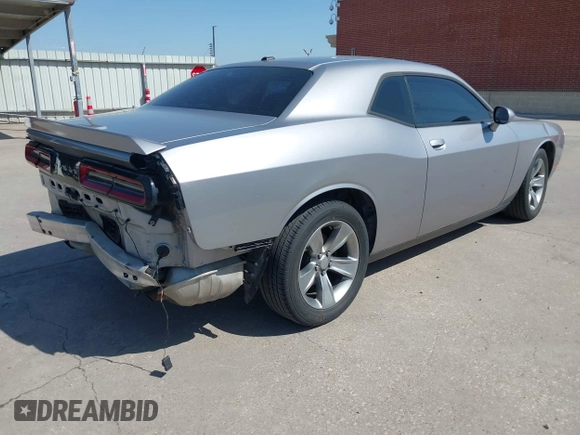 2015 Dodge Challenger SXT with VIN 2C3CDZAG2FH701021, listed as a IAAI auction lot 41986463 with 90,926 mi miles. Bid and sale history available at carsss.com. Image 4.