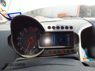 2014 Chevrolet Sonic LT with VIN 1G1JC5SH0E4210327, listed as a IAAI auction lot 42069313 with 94,506 mi miles and . Bid and sale history available at DreamBid. Image 7.