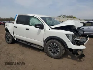 2021 Nissan Titan Pro-4X с VIN 1N6AA1ED9MN522375, выставлен на аукционе Copart как лот 54045655 с пробегом Не указан миль и Списание • Salvage title. История ставок и продаж доступна на DreamBid. Изображение 4.