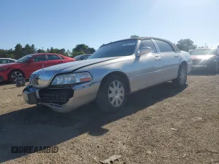 2004 Lincoln Town Car Ultimate z VIN 1LNHM83W94Y625182, wystawiony jako Copart lot #55632185 z przebiegiem 179 597 mil mil oraz Szkoda całkowita • Salvage title. Historia ofert i sprzedaży dostępna na DreamBid. Obrazek 1.
