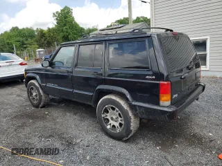 2000 Jeep Cherokee Classic with VIN 1J4FF58S8YL119611, listed as a Copart auction lot 57255685 with 148,908 mi miles and Clean title. Bid and sale history available at DreamBid. Image 2.