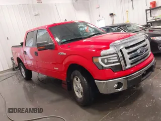 2011 Ford F-150 XLT with VIN 1FTFW1ETXBFC51156, listed as a IAAI auction lot 41653206 with 142,403 mi miles. Bid and sale history available at carsss.com. Image 1.