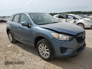 2015 Mazda CX-5 Sport z VIN JM3KE2BE8F0434116, wystawiony jako Copart lot #60712625 z przebiegiem 300 405 mil mil oraz Szkoda całkowita • Salvage title. Historia ofert i sprzedaży dostępna na DreamBid. Obrazek 4.