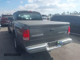 2003 Dodge Dakota SLT with VIN 1D7HL48N23S247441, listed as a IAAI auction lot 41359296 with 58,414 mi miles. Bid and sale history available at carsss.com. Image 3.