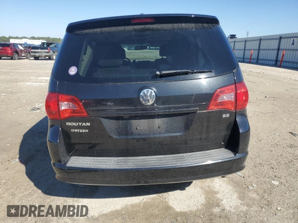 2014 Volkswagen Routan SE with VIN 2C4RVABG9ER135273, listed as a Copart auction lot 45343575 with 94,528 mi miles and Salvage title. Bid and sale history available at DreamBid. Image 6.