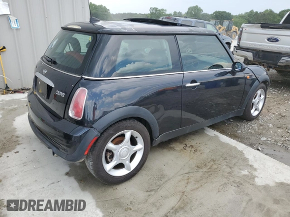 2005 MINI Hardtop with VIN WMWRC33595TJ72148, listed as a Copart auction lot 54310325 with 189,243 mi miles and Salvage title. Bid and sale history available at DreamBid. Image 3.