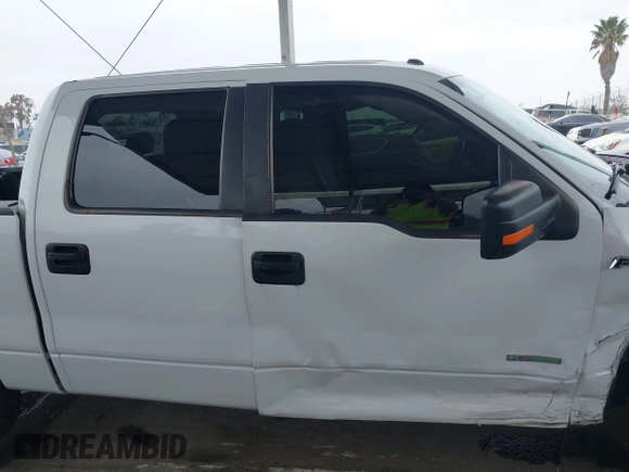 2014 Ford F-150 XL with VIN 1FTFW1CT1EKE22892, listed as a IAAI auction lot 42172851 with 14,203 mi miles and . Bid and sale history available at DreamBid. Image 13.
