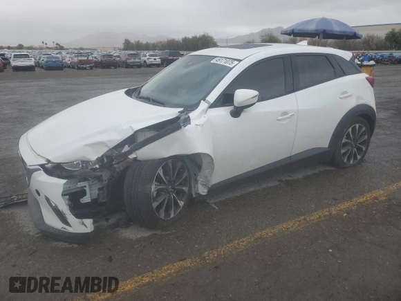 2019 Mazda CX-3 Touring with VIN JM1DKFC77K0450190, listed as a Copart auction lot 49171075 with 57,115 mi miles and Salvage Title. Bid and sale history available at carsss.com. Image 1.