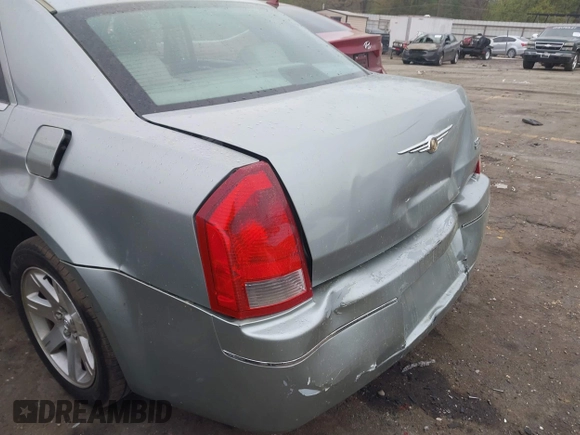 2006 Chrysler 300 Touring with VIN 2C3KA53G56H112376, listed as a IAAI auction lot 41919098 with 309,184 mi miles. Bid and sale history available at carsss.com. Image 6.