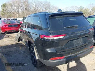 2024 Jeep Grand Cherokee Laredo X with VIN 1C4RJGAG7RC142320, listed as a IAAI auction lot 41709639 with 30,336 mi miles and . Bid and sale history available at DreamBid. Image 3.