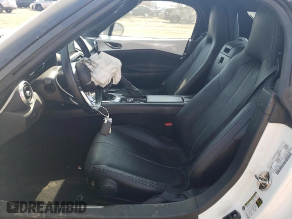 2020 Mazda MX-5 Miata Grand Touring z VIN JM1NDAD7XL0412292, wystawiony jako Copart lot #69792894 z przebiegiem 19 513 mil mil oraz Szkoda całkowita • Salvage title. Historia ofert i sprzedaży dostępna na DreamBid. Obrazek 7.