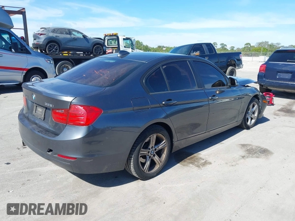 2015 BMW 3 Series 328i xDrive with VIN WBA3B5G54FNS19686, listed as a IAAI auction lot 41431980 with 74,613 mi miles and . Bid and sale history available at DreamBid. Image 4.