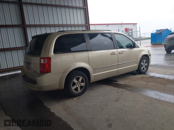 2010 Dodge Grand Caravan SXT with VIN 2D4RN5D17AR496854, listed as a IAAI auction lot 42210738 with 213,121 mi miles and . Bid and sale history available at DreamBid. Image 4.
