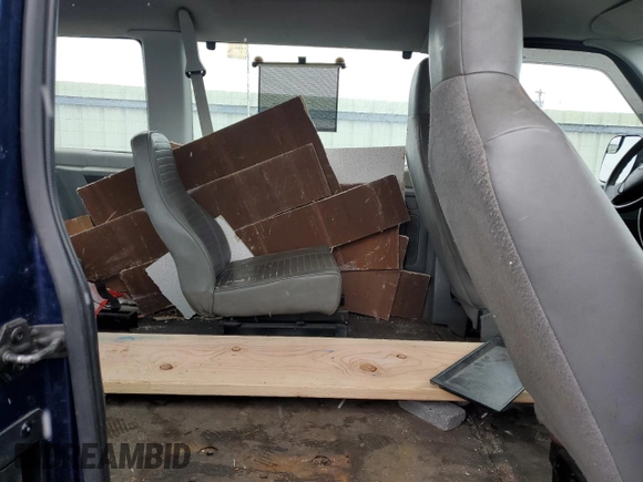 2012 Ford Econoline Passenger XL with VIN 1FBNE3BL7CDB17804, listed as a Copart auction lot 84530704 with 97,834 mi miles and Salvage title. Bid and sale history available at DreamBid. Image 11.