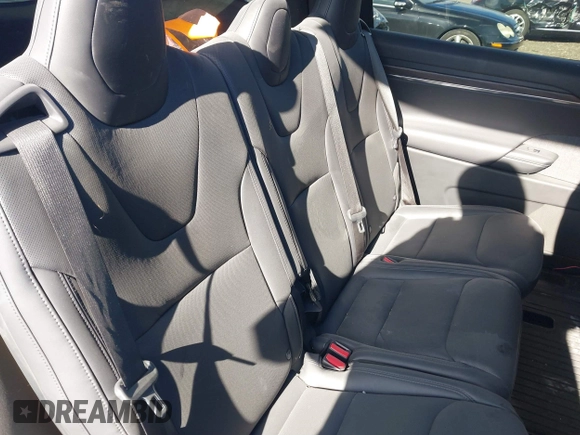 2023 Tesla Model X with VIN 7SAXCAE59PF377408, listed as a IAAI auction lot 41176738 with 32,496 mi miles and . Bid and sale history available at DreamBid. Image 8.