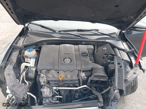 2012 Volkswagen Passat SE with VIN 1VWBP7A37CC021336, listed as a IAAI auction lot 41724459 with 124,832 mi miles. Bid and sale history available at carsss.com. Image 10.