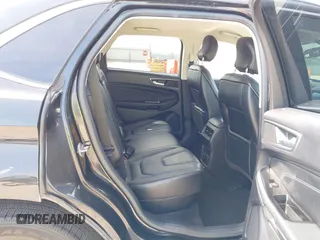 2015 Ford Edge Titanium z VIN 2FMTK3K87FBC06852, wystawiony jako IAAI lot #42335238 z przebiegiem 187 256 mil mil oraz . Historia ofert i sprzedaży dostępna na DreamBid. Obrazek 8.