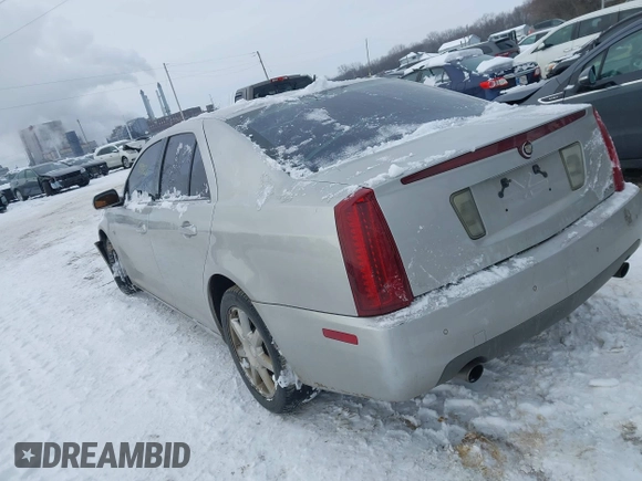 2005 Cadillac STS with VIN 1G6DW677950139768, listed as a IAAI auction lot 41249405 with 253,992 mi miles. Bid and sale history available at carsss.com. Image 3.
