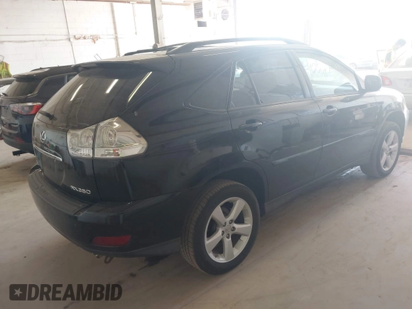 2007 Lexus RX 350 with VIN 2T2HK31U87C025076, listed as a IAAI auction lot 42220621 with 173,906 mi miles and . Bid and sale history available at DreamBid. Image 4.