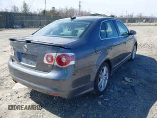 2006 Volkswagen Jetta Sedan 2.5L with VIN 3VWSG71K26M740777, listed as a IAAI auction lot 41743566 with 164,174 mi miles. Bid and sale history available at carsss.com. Image 4.