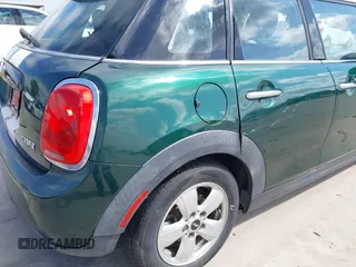 2016 MINI Hardtop 4 Door with VIN WMWXU1C52G2D10035, listed as a IAAI auction lot 42190544 with 106,383 mi miles and . Bid and sale history available at DreamBid. Image 18.