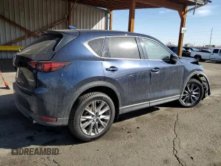 2020 Mazda CX-5 Grand Touring with VIN JM3KFBDM3L0786159, listed as a Copart auction lot 48535635 with 87,540 mi miles and Salvage Title. Bid and sale history available at carsss.com. Image 3.