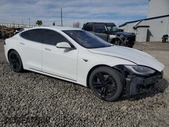 2016 Tesla Model S 90D with VIN 5YJSA1E27GF142380, listed as a Copart auction lot 50661905 with 104,865 mi miles and Salvage Title. Bid and sale history available at DreamBid. Image 4.
