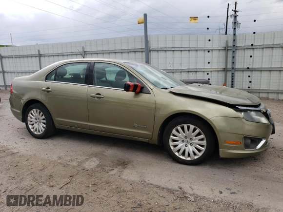 2012 Ford Fusion Hybrid с VIN 3FADP0L33CR218348, выставлен на аукционе Copart как лот 57134285 с пробегом 165 818 миль миль и Списание • Salvage title. История ставок и продаж доступна на DreamBid. Изображение 4.
