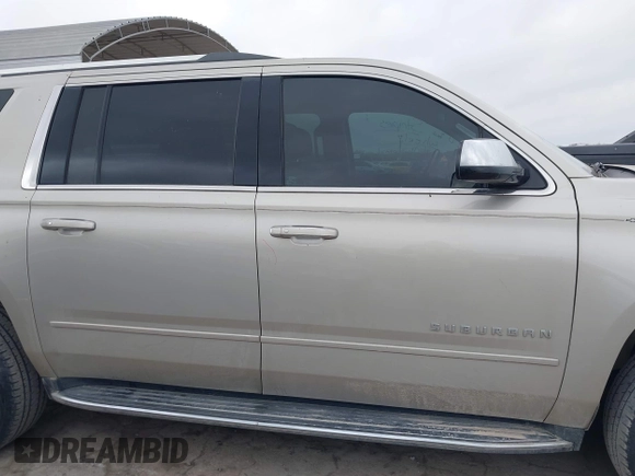 2017 Chevrolet Suburban Premier with VIN 1GNSCJKC4HR183592, listed as a IAAI auction lot 41514348 with 144,460 mi miles and . Bid and sale history available at DreamBid. Image 14.