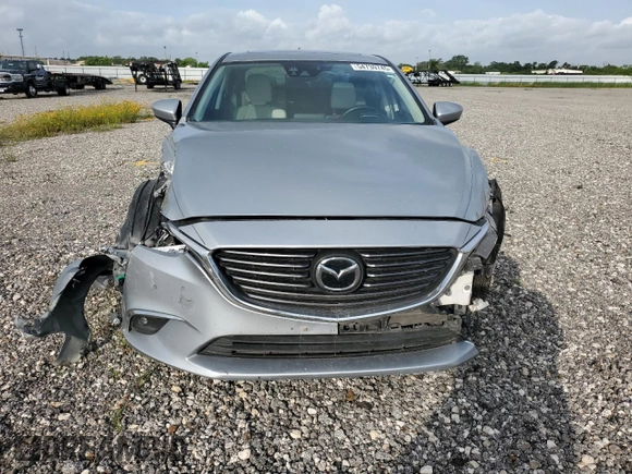 2016 Mazda 6 i Grand Touring с VIN JM1GJ1W53G1434499, выставлен на аукционе Copart как лот 54739745 с пробегом Не указан миль и Списание • Salvage title. История ставок и продаж доступна на DreamBid. Изображение 5.