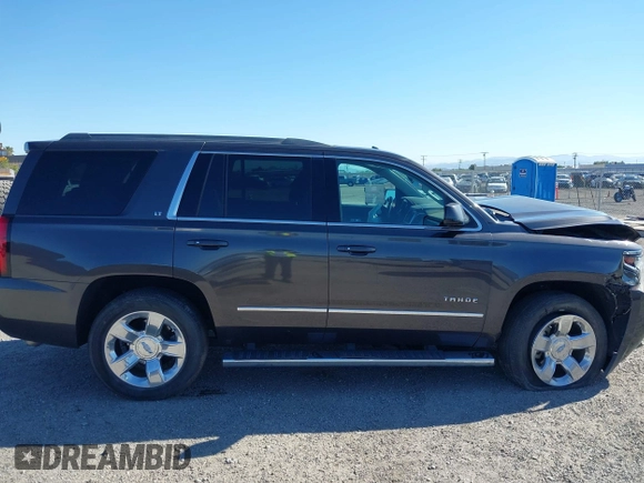 2017 Chevrolet Tahoe LT with VIN 1GNSCBKC1HR403647, listed as a IAAI auction lot 42237667 with 90,969 mi miles and . Bid and sale history available at DreamBid. Image 13.