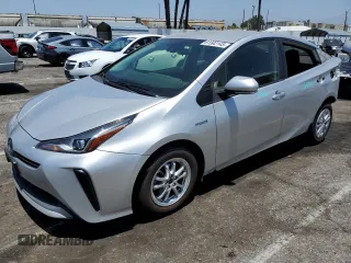 2020 Toyota Prius L Eco with VIN JTDKARFU4L3111867, listed as a Copart auction lot 61502145 with 323,624 mi miles and Salvage title. Bid and sale history available at DreamBid. Image 1.