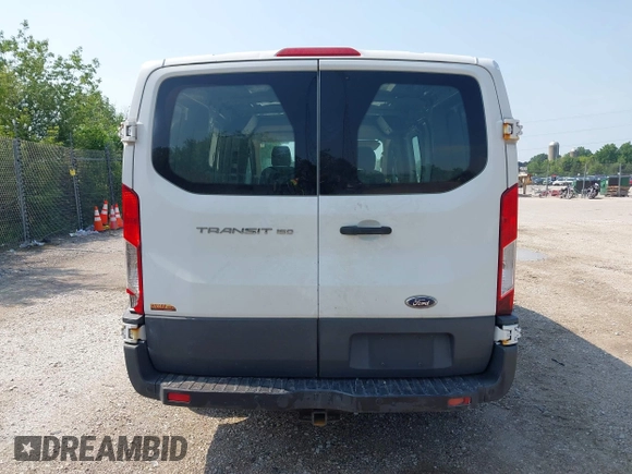 2015 Ford Transit Cargo z VIN 1FTNE1ZM4FKB15801, wystawiony jako IAAI lot #42674219 z przebiegiem 228 634 mil mil oraz . Historia ofert i sprzedaży dostępna na DreamBid. Obrazek 16.