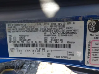 2018 Ford Fiesta SE with VIN 3FADP4BJ4JM135965, listed as a IAAI auction lot 41569841 with 128,347 mi miles. Bid and sale history available at carsss.com. Image 9.