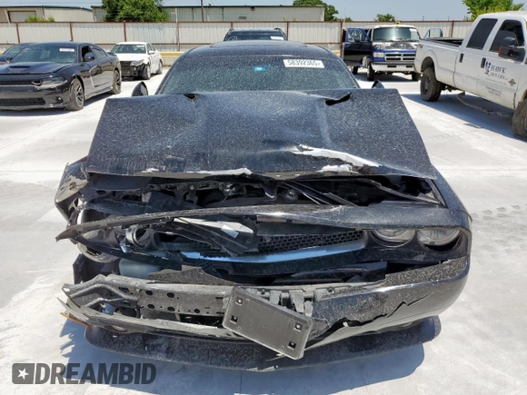 2014 Dodge Challenger R/T Plus z VIN 2C3CDYBT0EH122467, wystawiony jako Copart lot #58392365 z przebiegiem 136 793 mil mil oraz Szkoda całkowita • Salvage title. Historia ofert i sprzedaży dostępna na DreamBid. Obrazek 5.