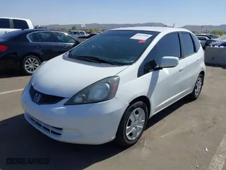 2013 Honda Fit with VIN JHMGE8H34DC065367, listed as a IAAI auction lot 41657904 with 119,861 mi miles. Bid and sale history available at carsss.com. Image 2.
