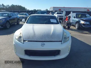 2013 Nissan 370Z z VIN JN1AZ4EH4DM380820, wystawiony jako IAAI lot #41547638 z przebiegiem 118 222 mil mil oraz . Historia ofert i sprzedaży dostępna na DreamBid. Obrazek 12.