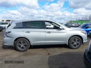2019 Infiniti QX60 Luxe with VIN 5N1DL0MMXKC554603, listed as a IAAI auction lot 41751072 with 49,654 mi miles and . Bid and sale history available at DreamBid. Image 13.