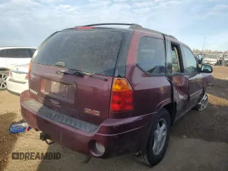 2004 GMC Envoy SLE with VIN 1GKDT13S342304711, listed as a Copart auction lot 44695385 with 129,804 mi miles and Salvage Title. Bid and sale history available at carsss.com. Image 3.