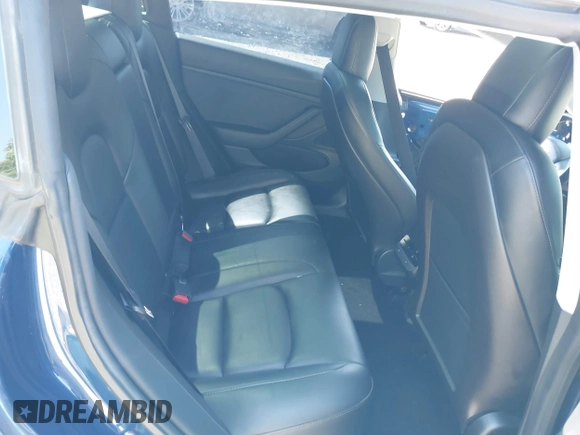 2019 Tesla Model 3 Mid Range with VIN 5YJ3E1EA6KF402308, listed as a IAAI auction lot 40077902 with 89,794 mi miles and . Bid and sale history available at carsss.com. Image 8.