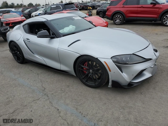 2021 Toyota GR Supra 3.0 with VIN WZ1DB0C0XMW039660, listed as a Copart auction lot 86909354 with 30,272 mi miles and Salvage Title. Bid and sale history available at carsss.com. Image 4.