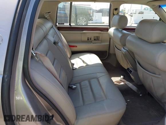 1995 Cadillac DeVille z VIN 1G6KD52B8SU251727, wystawiony jako IAAI lot #42479284 z przebiegiem 104 080 mil mil oraz . Historia ofert i sprzedaży dostępna na DreamBid. Obrazek 8.