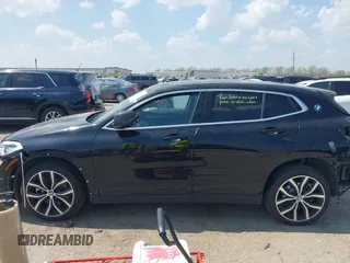 2018 BMW X2 xDrive28i with VIN WBXYJ5C33JEF80454, listed as a IAAI auction lot 41876188 with 34,596 mi miles. Bid and sale history available at carsss.com. Image 15.