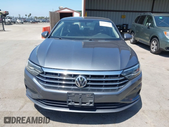 2019 Volkswagen Jetta S z VIN 3VWC57BUXKM074708, wystawiony jako IAAI lot #42151448 z przebiegiem 189 430 mil mil oraz . Historia ofert i sprzedaży dostępna na DreamBid. Obrazek 12.